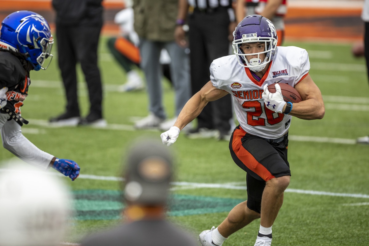 Feb 1, 2023; Mobile, AL, USA; National running back Evan Hull of Northwestern (26) practices during the second day of Senior Bowl week at Hancock Whitney Stadium in Mobile.